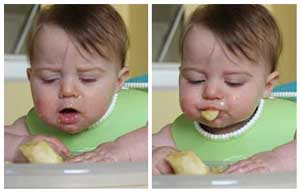 baby eating a banana and spitting some of it back out