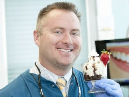 dr drews holding up an ice cream sundae