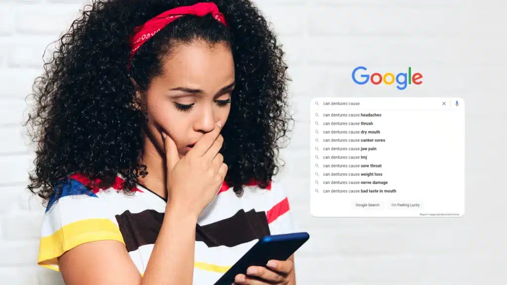 woman finding worries by googling dentures can cause and reading the auto-suggestions provided