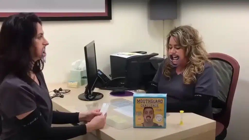 karey and mindy playing the mouthguard challenge game