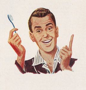 vintage toothbrush ad depicting a happy man in pajamas holding a toothbrush